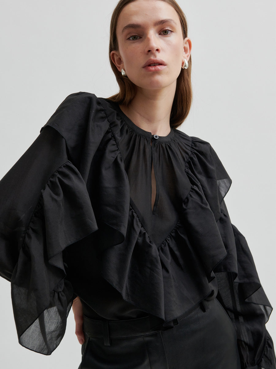 Second Female Fria Röyhelöpusero Musta