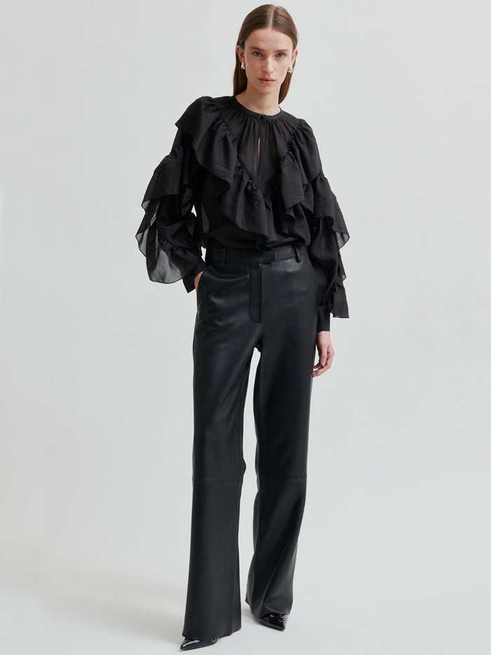 Second Female Fria Röyhelöpusero Musta