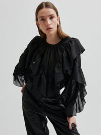 Second Female Fria Röyhelöpusero Musta