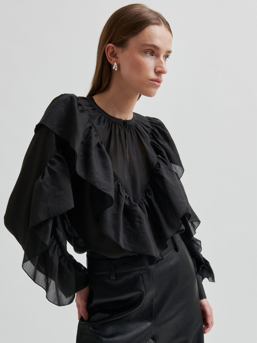 Second Female Fria Röyhelöpusero Musta