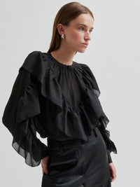 Second Female Fria Röyhelöpusero Musta